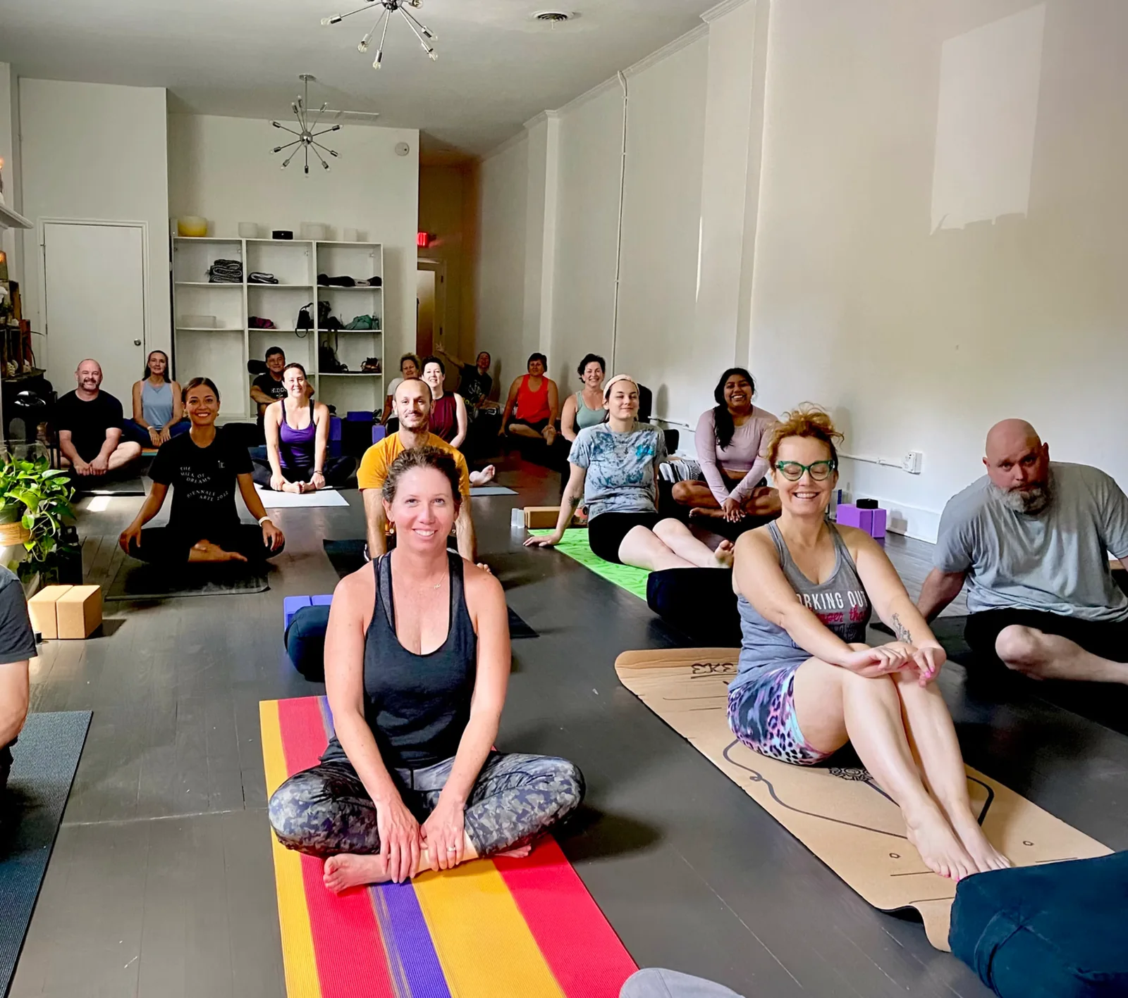 Students seated together after a class at Village Yoga Old Hickory