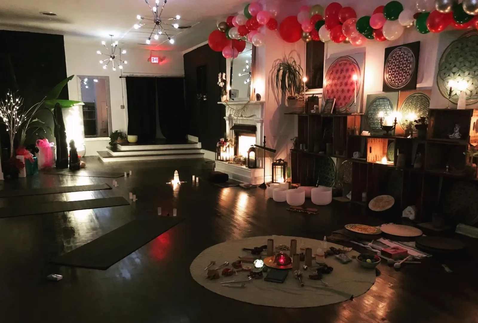 Village Yoga studio prepared for a candlelit sound bath and community event